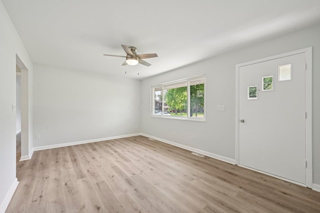 106 Woodrow Ave, Delaware, OH 43015 - entryway with ceiling fan, wood finished floors, and baseboards