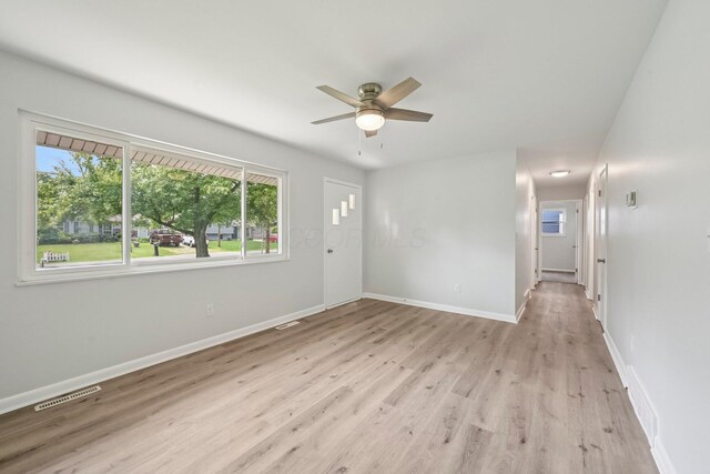 106 Woodrow Ave, Delaware, OH 43015 - empty room featuring ceiling fan, light wood-style floors, and baseboards