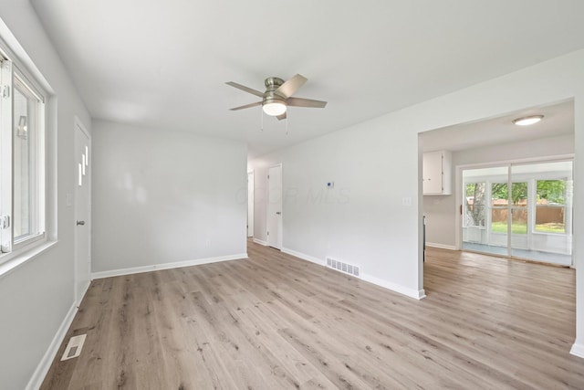 106 Woodrow Ave, Delaware, OH 43015 - unfurnished room with light wood finished floors, ceiling fan, and baseboards