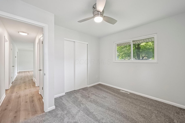 106 Woodrow Ave, Delaware, OH 43015 - unfurnished bedroom featuring baseboards, a closet, and ceiling fan