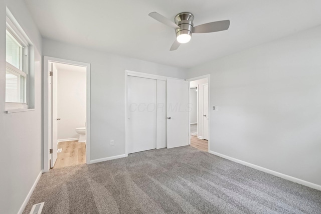 106 Woodrow Ave, Delaware, OH 43015 - unfurnished bedroom featuring carpet flooring, baseboards, ensuite bathroom, and a closet