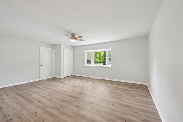 106 Woodrow Ave, Delaware, OH 43015 - empty room with a ceiling fan, wood finished floors, and baseboards
