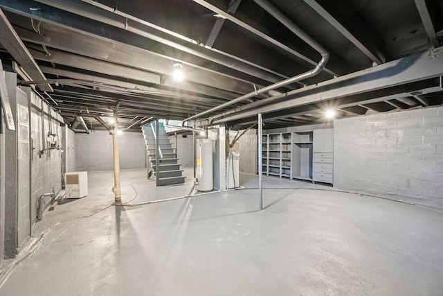 106 Woodrow Ave, Delaware, OH 43015 - unfinished basement with water heater and stairway