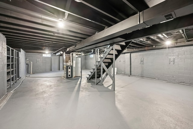 106 Woodrow Ave, Delaware, OH 43015 - unfinished below grade area with stairs, gas water heater, electric panel, and heating unit