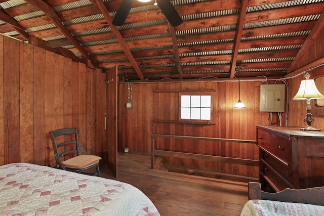 3381/2 16th St, Lancaster, OH 43130 - bedroom featuring wood walls, electric panel, hardwood / wood-style floors, and wooden ceiling
