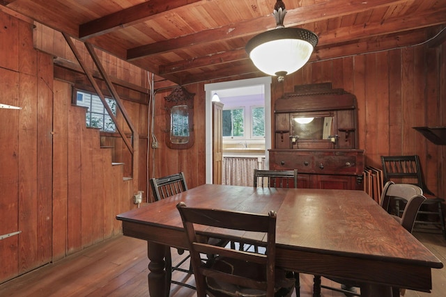 3381/2 16th St, Lancaster, OH 43130 - dining room featuring wood walls, hardwood / wood-style flooring, wood ceiling with exposed beams, and stairway