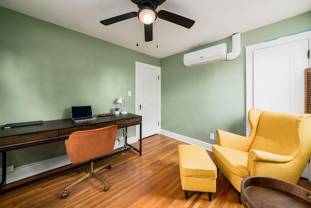 141 S Kellner Rd, Columbus, OH 43209 - office area featuring a wall mounted air conditioner, wood finished floors, and ceiling fan