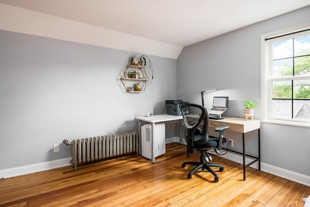 141 S Kellner Rd, Columbus, OH 43209 - office area with radiator, wood finished floors, and vaulted ceiling