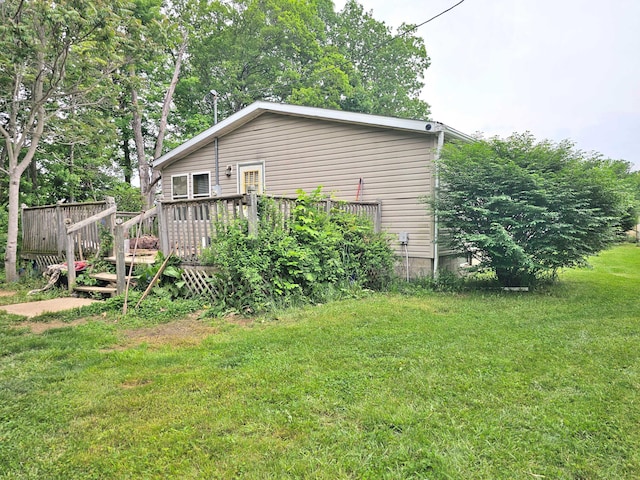 2163 Moody Hollow Rd, Blue Rock, OH 43720 - view of property exterior with a wooden deck and a lawn