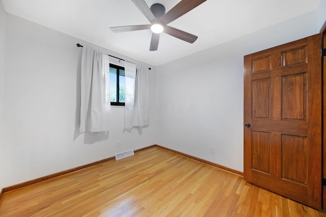 1345 Molly Ln, Columbus, OH 43207 - empty room featuring light wood finished floors and a ceiling fan