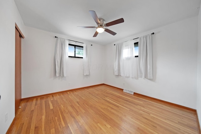 1345 Molly Ln, Columbus, OH 43207 - empty room featuring light wood-type flooring and a ceiling fan