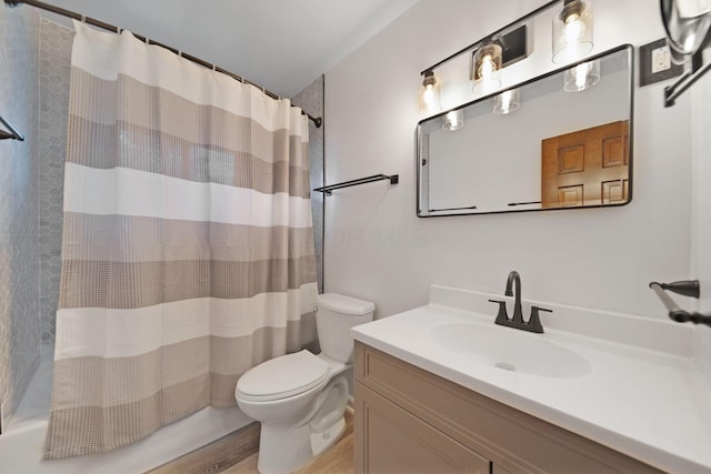 1345 Molly Ln, Columbus, OH 43207 - full bath featuring vanity, wood finished floors, and shower / bath combo