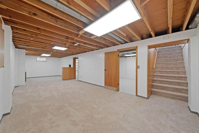 1345 Molly Ln, Columbus, OH 43207 - basement featuring light carpet and stairway