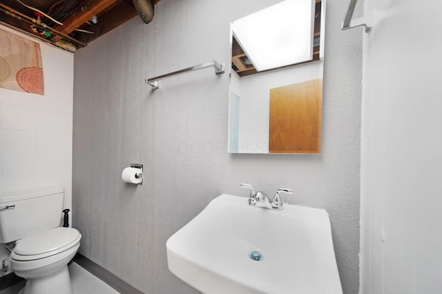1345 Molly Ln, Columbus, OH 43207 - half bathroom with a sink and toilet