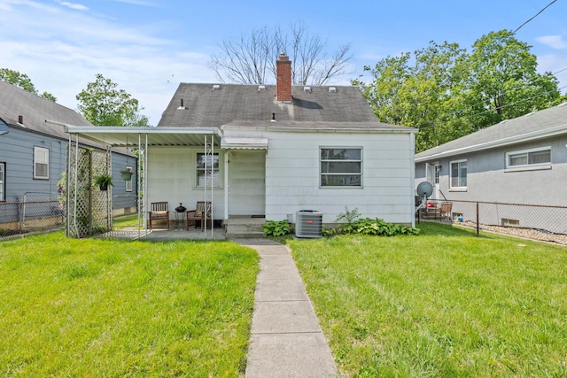 2770 Columbus Ave, Bexley, OH 43209 - rear view of property featuring a chimney, central AC unit, and roof with shingles