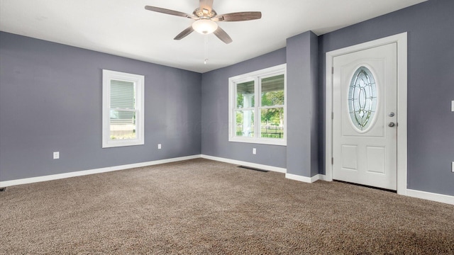 422 N Cedar St, Newark, OH 43055 - carpeted entryway featuring a ceiling fan and baseboards