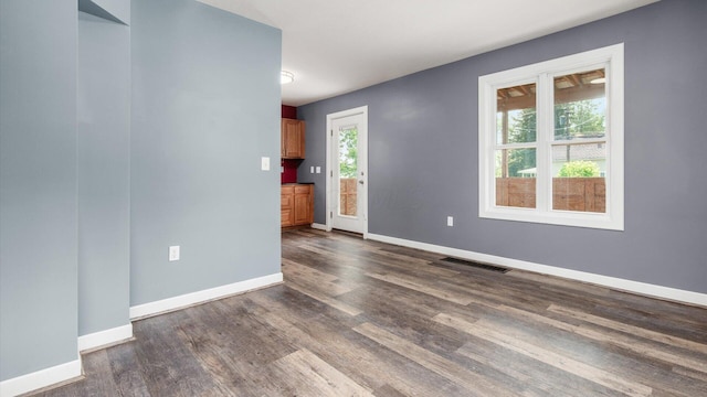 422 N Cedar St, Newark, OH 43055 - spare room with dark wood-style flooring and baseboards
