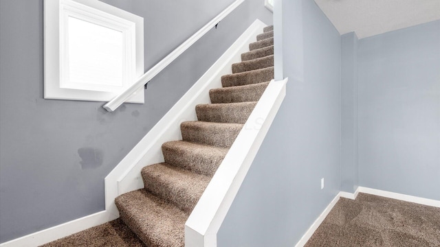 422 N Cedar St, Newark, OH 43055 - staircase with carpet and baseboards