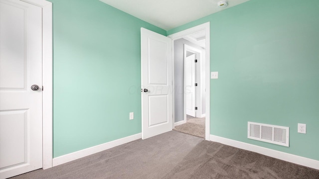 422 N Cedar St, Newark, OH 43055 - unfurnished bedroom with carpet floors and baseboards