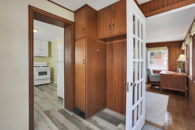 78 Griswold St, Delaware, OH 43015 - hallway with french doors, wood finished floors, and a desk