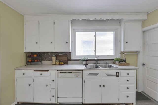 78 Griswold St, Delaware, OH 43015 - kitchen with dishwasher, a sink, white cabinets, and light countertops