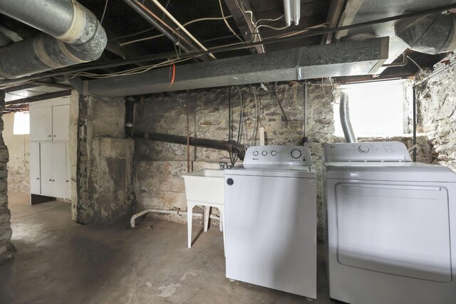78 Griswold St, Delaware, OH 43015 - below grade area featuring washing machine and dryer and a sink
