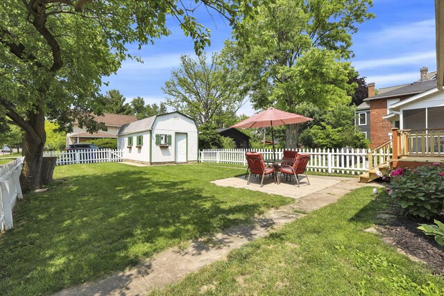 78 Griswold St, Delaware, OH 43015 - view of yard featuring an outbuilding and a patio area