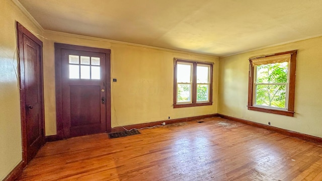 949 Mohican Ave, Logan, OH 43138 - entrance foyer featuring ornamental molding, wood finished floors, and baseboards