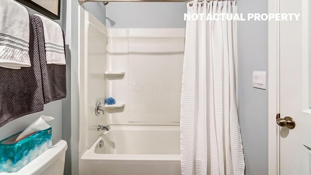 1444 Chrisman Dr, Columbus, OH 43223 - bathroom with shower / tub combo with curtain and toilet