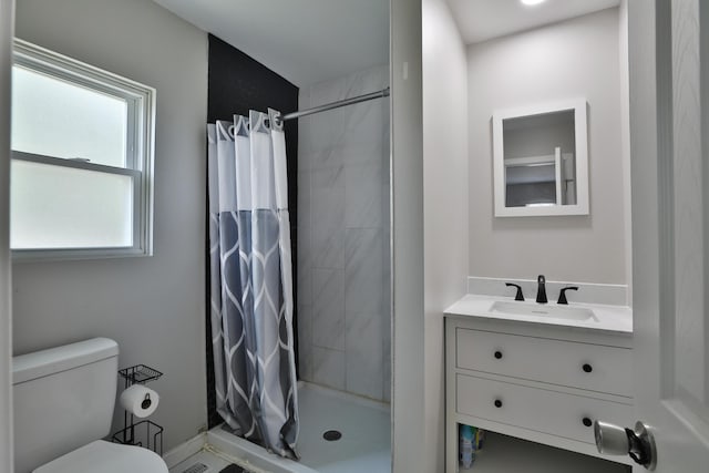 1208 Seymour Ave, Columbus, OH 43206 - full bath with toilet, vanity, and a stall shower