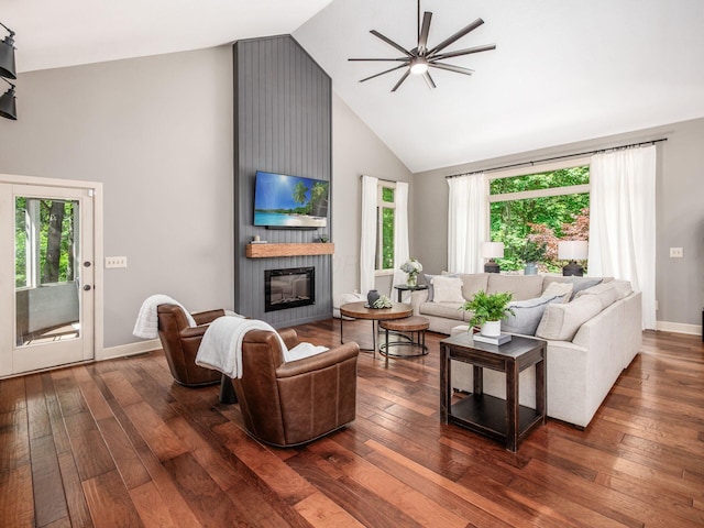 1488 Brittingham Ln, Powell, OH 43065 - living area featuring high vaulted ceiling, a large fireplace, dark wood-style floors, and ceiling fan