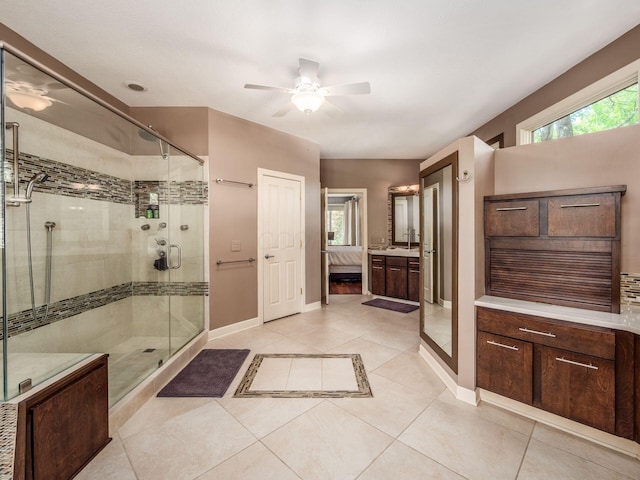 1488 Brittingham Ln, Powell, OH 43065 - ensuite bathroom featuring ceiling fan, a shower stall, and tile patterned floors