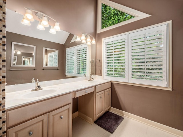 1488 Brittingham Ln, Powell, OH 43065 - bathroom with double vanity, tile patterned flooring, and lofted ceiling