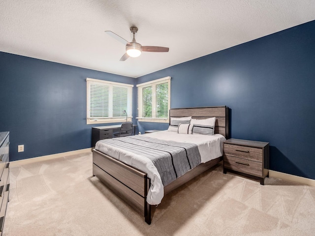 1488 Brittingham Ln, Powell, OH 43065 - bedroom with carpet, a textured ceiling, and ceiling fan