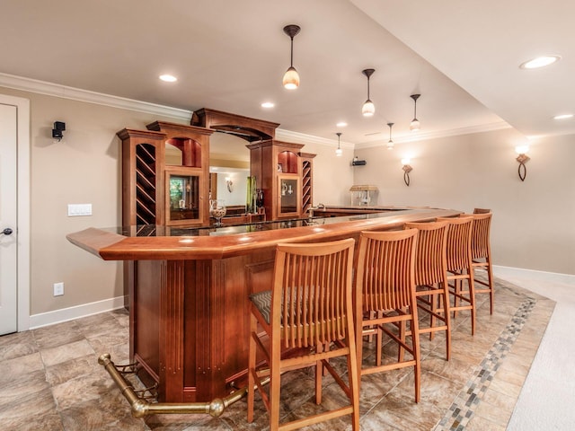 1488 Brittingham Ln, Powell, OH 43065 - indoor wet bar featuring ornamental molding, recessed lighting, and hanging light fixtures