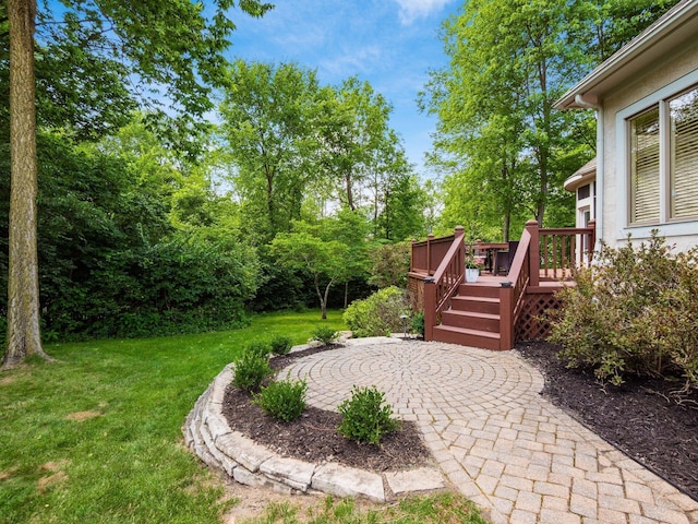 1488 Brittingham Ln, Powell, OH 43065 - view of grassy yard featuring a wooden deck and a patio