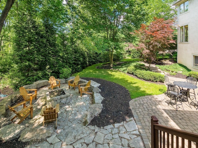 1488 Brittingham Ln, Powell, OH 43065 - view of patio featuring a fire pit