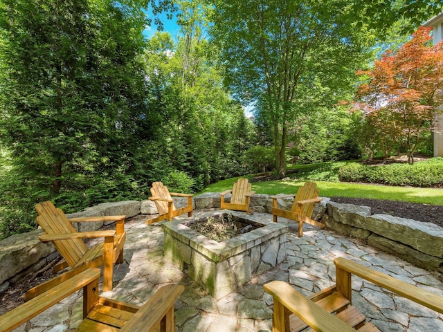 1488 Brittingham Ln, Powell, OH 43065 - view of patio / terrace with an outdoor fire pit