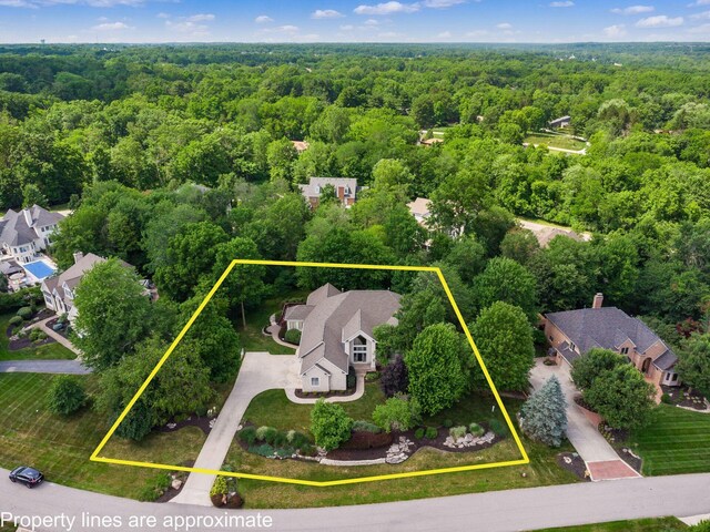 1488 Brittingham Ln, Powell, OH 43065 - aerial overview of property's location with a heavily wooded area and property parcel outlined
