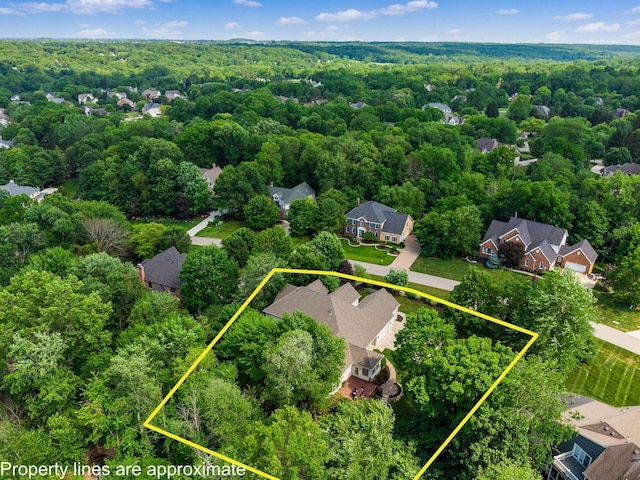 1488 Brittingham Ln, Powell, OH 43065 - aerial view of residential area featuring property parcel outlined and a heavily wooded area