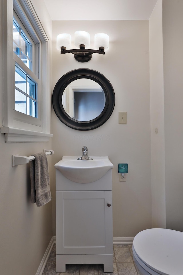155 Aldrich Rd, Columbus, OH 43214 - half bathroom with vanity and marble look tiles
