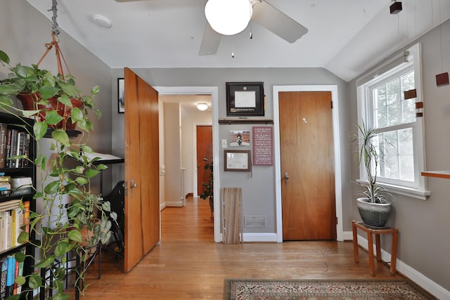 155 Aldrich Rd, Columbus, OH 43214 - foyer entrance featuring a ceiling fan, light wood-style floors, and vaulted ceiling