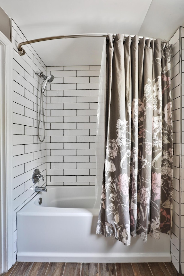 155 Aldrich Rd, Columbus, OH 43214 - full bath featuring shower / tub combo and wood finished floors