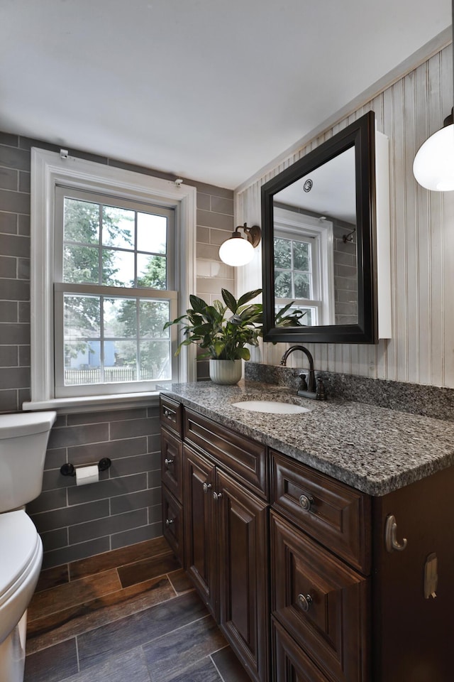 155 Aldrich Rd, Columbus, OH 43214 - bathroom featuring vanity and tile walls