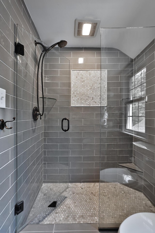 155 Aldrich Rd, Columbus, OH 43214 - full bathroom with a stall shower and toilet