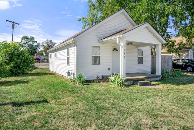1997 Ferris Rd, Columbus, OH 43224 - view of front of home with a front yard and a porch