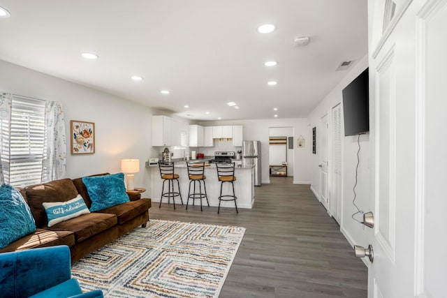 1997 Ferris Rd, Columbus, OH 43224 - living room with recessed lighting, wood finished floors, and baseboards