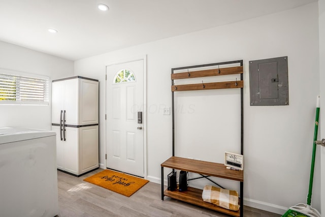 1997 Ferris Rd, Columbus, OH 43224 - entrance foyer featuring electric panel, light wood finished floors, healthy amount of natural light, recessed lighting, and washer / dryer