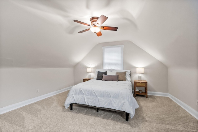 145 E Sycamore St, Columbus, OH 43206 - carpeted bedroom with vaulted ceiling, a ceiling fan, and baseboards