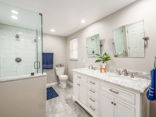 1360 Clubview Blvd S, Columbus, OH 43235 - bathroom featuring double vanity, a stall shower, recessed lighting, toilet, and marble finish floors